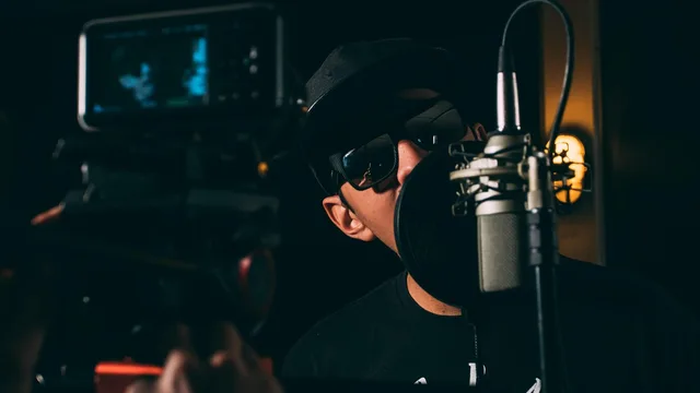 man, microphone, music, musician, recording, singer, rapper, rap, singing, audio equipment, recording studio, microphone, singer, singer, rapper, rapper, rapper, rap, rap, rap, rap, rap, singing, singing, singing, recording studio. Host-Reads steuern